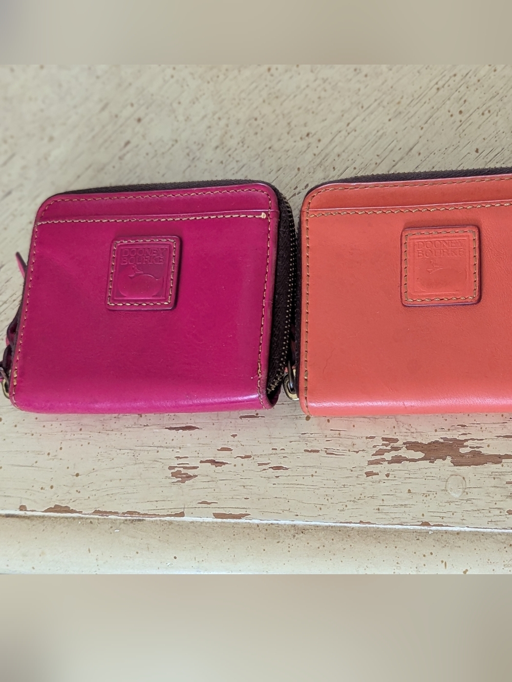 Dooney & Bourke Florentine Wallets Pink and Coral Leather Zip Wallets